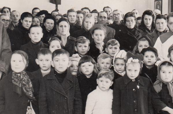 Group of children in a displaced persons camp. Helen is located near the middle.